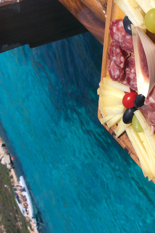 From San Paolo: Tavolara and Molara Island Cruise with Lunch - What the boat day feels like