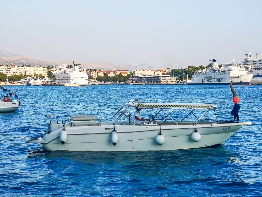 From Split: Blue Cave & 5 Islands with Vis & Hvar Boat Tour - Stiniva Cove from the water