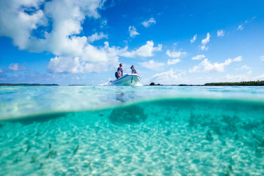 From Tahiti: Tetiaroa Island Tour by Sailing Catamaran - Landing on Tetiaroa by dinghy