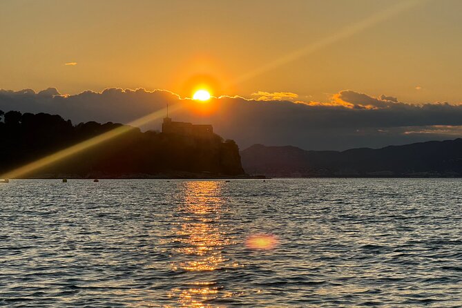 Golf Juan: Sunset Sailing Cruise with aperitif at the Island - The Sainte-Marguerite Island Swimming Stop