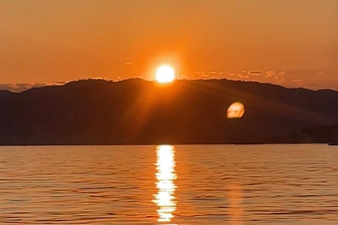 Golf Juan: Sunset Sailing Cruise with aperitif at the Island - Watching the Sun Set From the Water