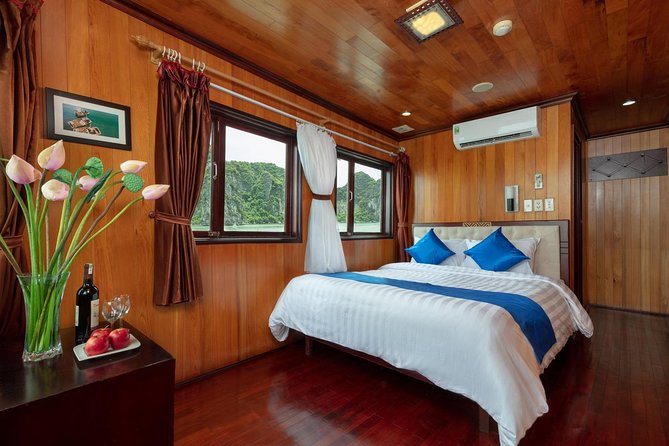 Halong deluxe cruise 2D/1N: Surprise cave, Titop island, Full Meals, best prices - Titop Island, viewpoint, and beach