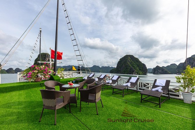 Halong deluxe cruise 2D/1N: Surprise cave, Titop island, Full Meals, best prices - Sunset, dinner, and a night aboard