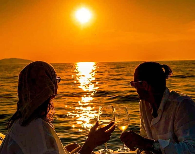 Heraklion: Dia Island Sunset Boat Tour with Dinner - Dinner on board with Greek flavors