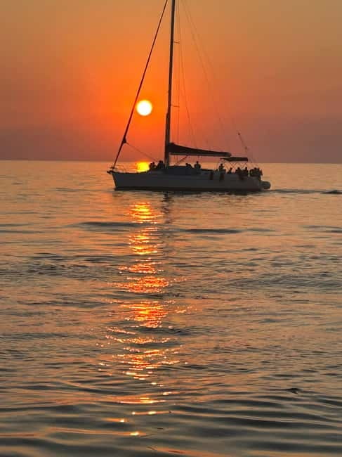 Heraklion: Dia Island Sunset Boat Tour with Dinner - Saint George Bay and three hours at Dia Island