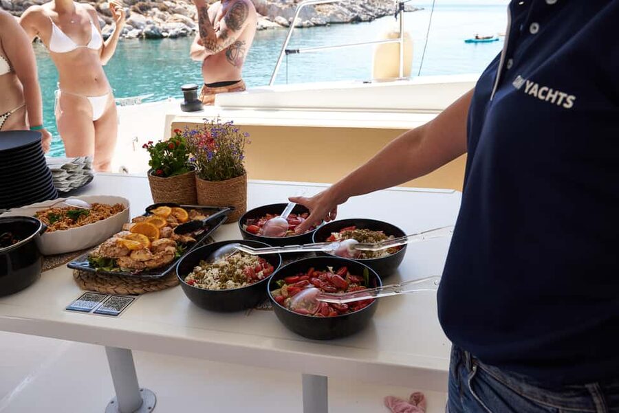Hersonissos: Catamaran Sailing Trip to Dia Island with Lunch - Getting to the port and back