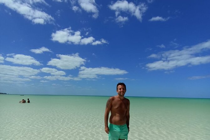 Holbox Island Tour Golf Cart Ferry with Lunch and Transportation - Booking, weather, and cancellation details
