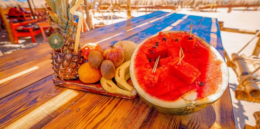 Hurghada: Hula Hula Island Boat Trip with Snorkeling & Lunch - Beach time, banana boats, and the island lunch