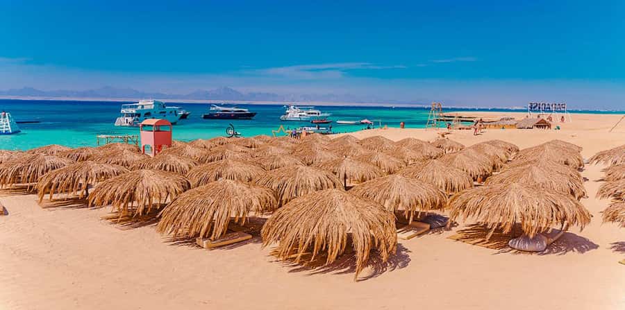 Hurghada: Hula Hula Island Boat Trip with Snorkeling & Lunch - The massage and other extras