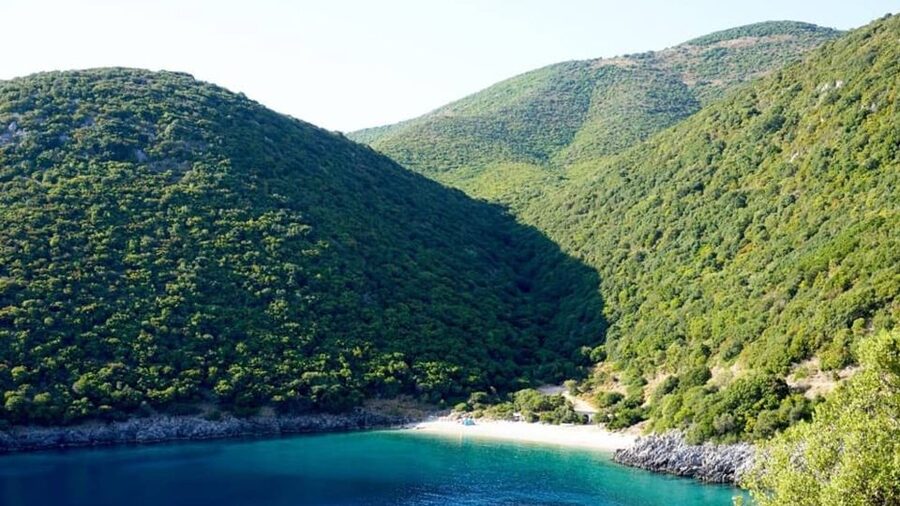 Kefalonia: Island Highlights Bus and Boat Tour with Lunch - The coastal boat ride and the swim stop