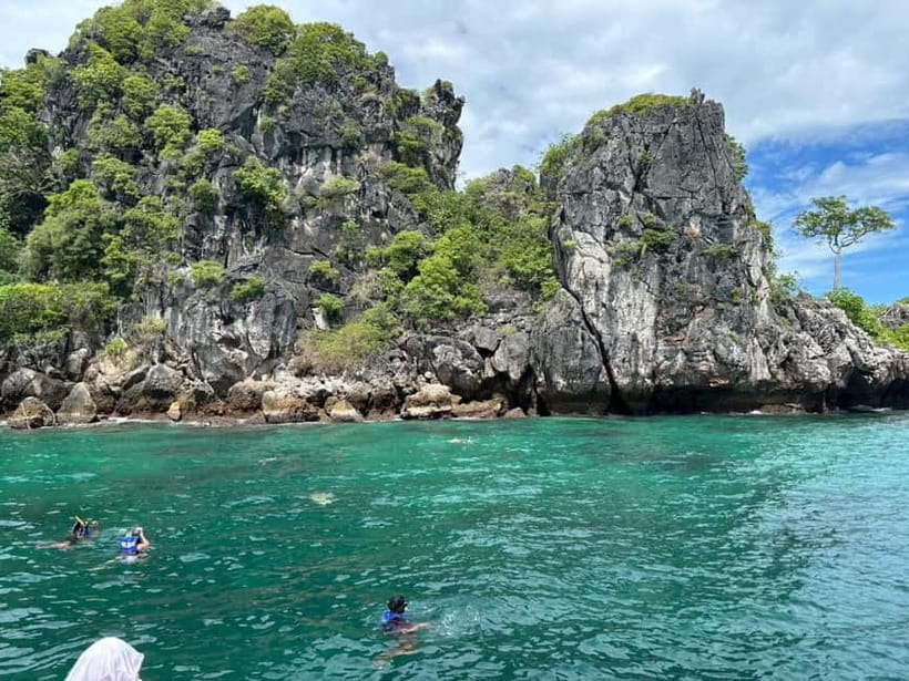 Krabi: 7 Islands Sunset by Longtail Boat with Snorkeling - Chicken Island and its famous profile