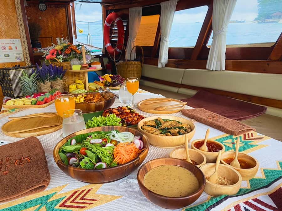 Krabi: Luxury Boat 7 Island Sunset With BBQ & Plankton Tour - Phra Nang Cave and beach: scenery with a local belief