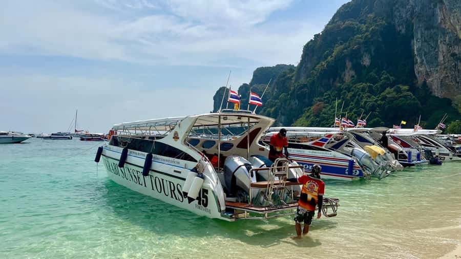 Krabi: Phi Phi & 4 Islands Sunset Tour by Speedboat - The walk to Maya Bay is part of the experience