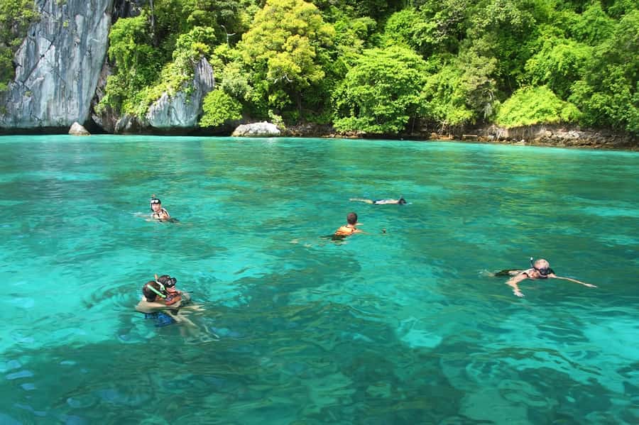 Krabi: Phi Phi Island Sunset Maya Bay and Four Islands Tour - Bamboo Island adds a quieter beach break