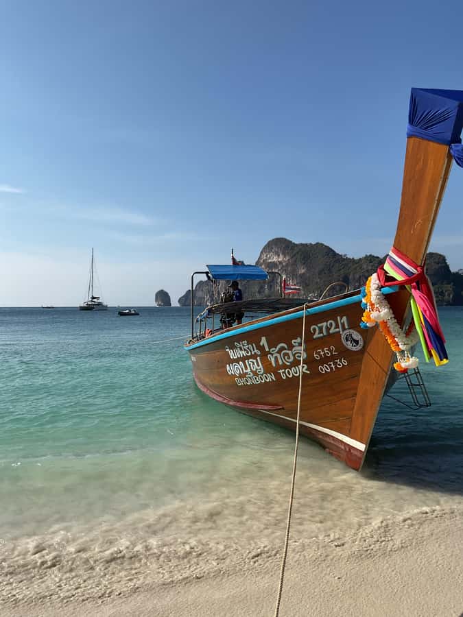 Krabi: Phi Phi Islands Longtail Boat Tour with Sunset - Bioluminescent plankton: a conditional extra