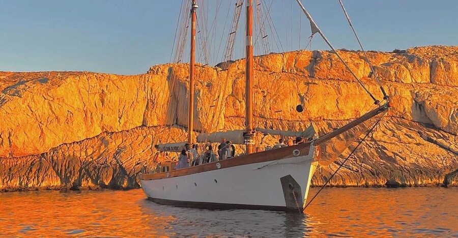Marseille: Frioul Islands Sunset Cruise with Cocktail Dinner - Dinner on deck with organic wine