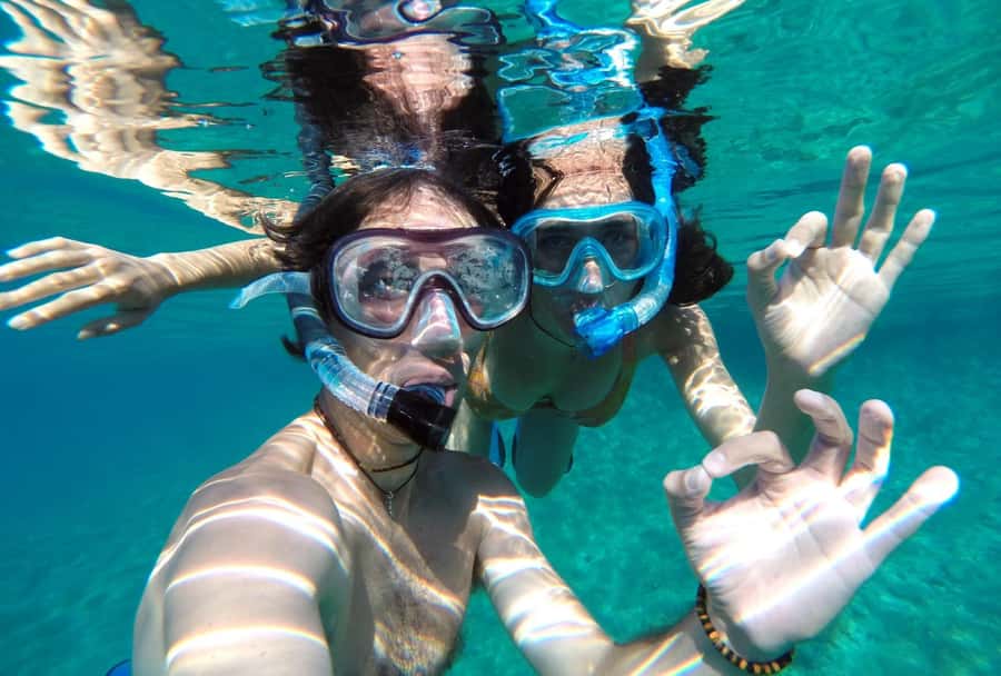Matemwe: Mnemba Island Dolphin & Snorkeling Boat Trip - Timing, transfers, and physical comfort