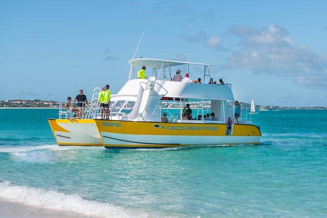 Morning Half Day Cruise from Providenciales with Snorkeling and Iguana Island - Lunch, rum punch, and the conch demonstration