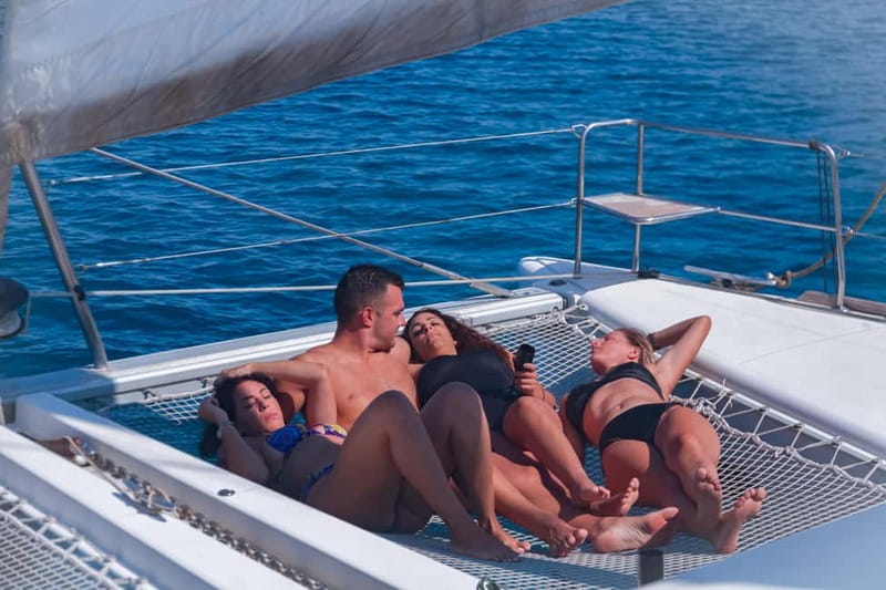 Mykonos: Rhenia Island Catamaran Cruise with Meal and Drinks - Two hours in a Rhenia cove