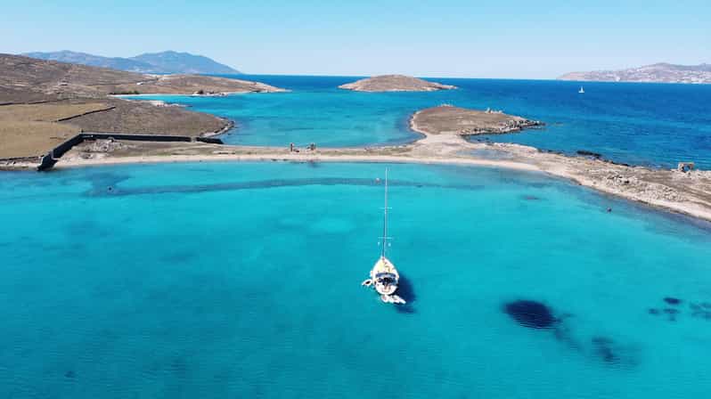 Mykonos: Rhenia Island Sunset Cruise with Transfer and Meal - Rhenia Island, Mykonos’ quieter swimming stop