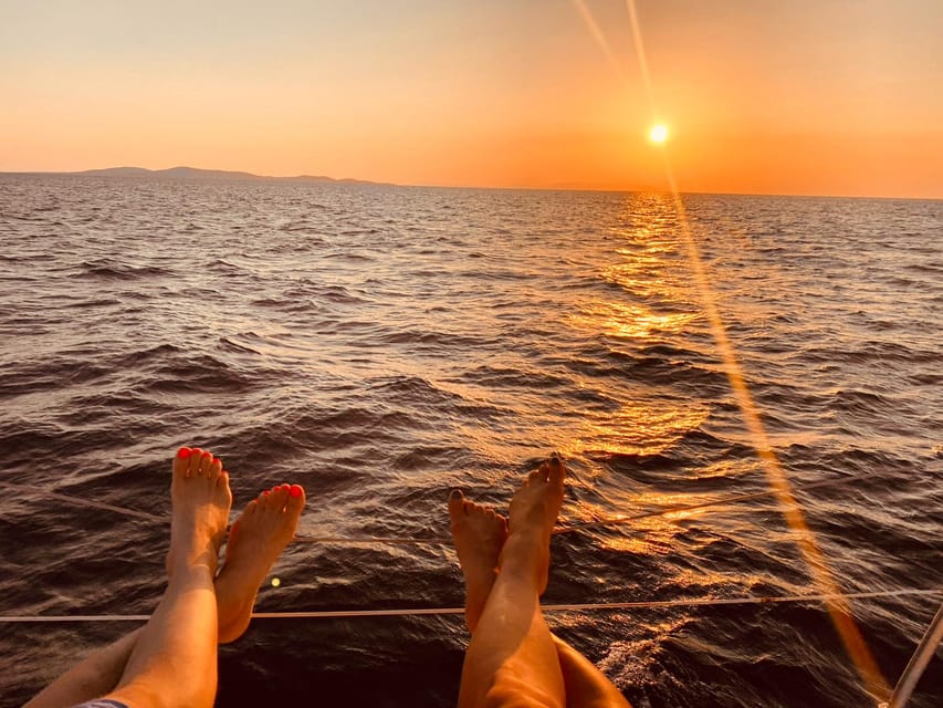 Mykonos: Rhenia Island Sunset Cruise with Transfer and Meal - Greek food, wine, beer, and a relaxed meal on board