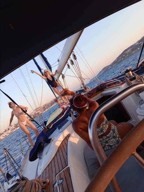 Mykonos: Rhenia Island Sunset Cruise with Transfer and Meal - Sunset near Little Venice