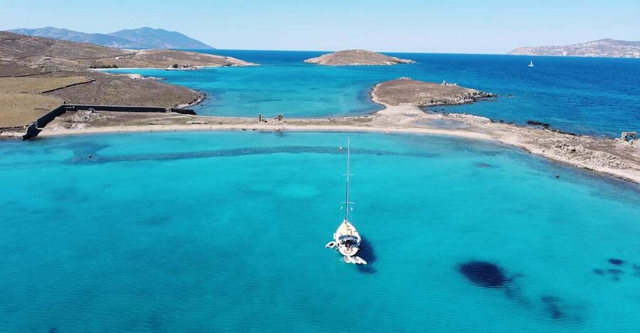 Mykonos: Rhenia Island Sunset Cruise with Transfer and Meal - Two and a half hours for swimming and paddleboarding