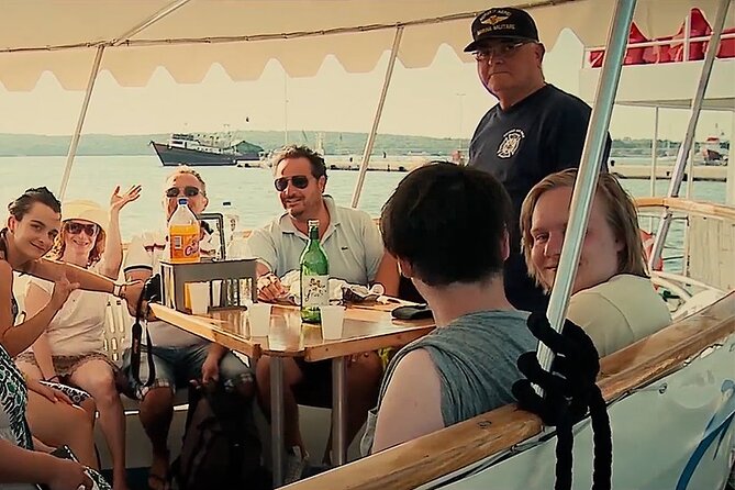 NP Brijuni Island Swimming & Dolphin Watching Sunset Cruise - Sunset views and Pula after dark