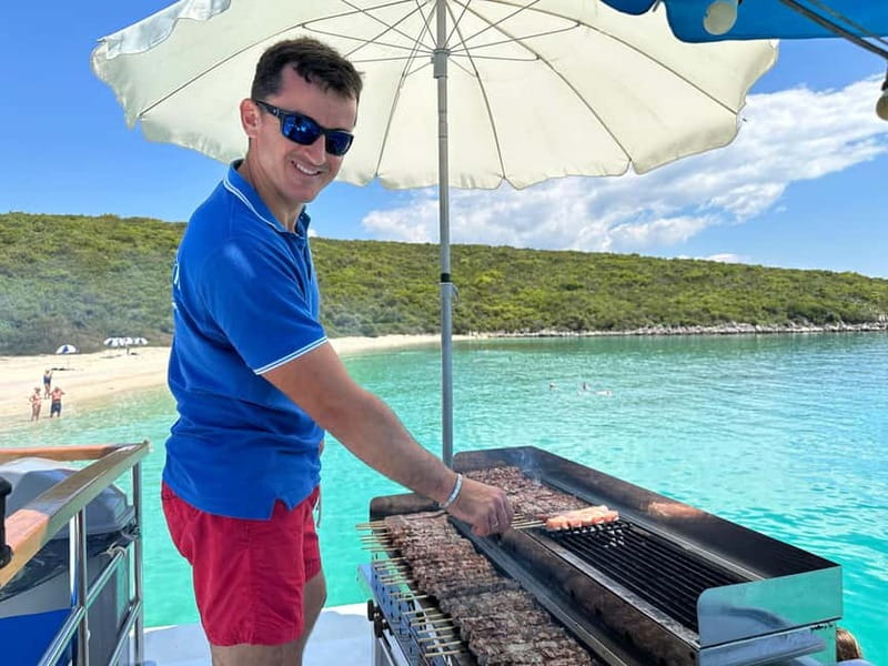 Nydri: Island Hopping Boat Cruise with Beach BBQ Lunch - Skorpios and the return to Nydri