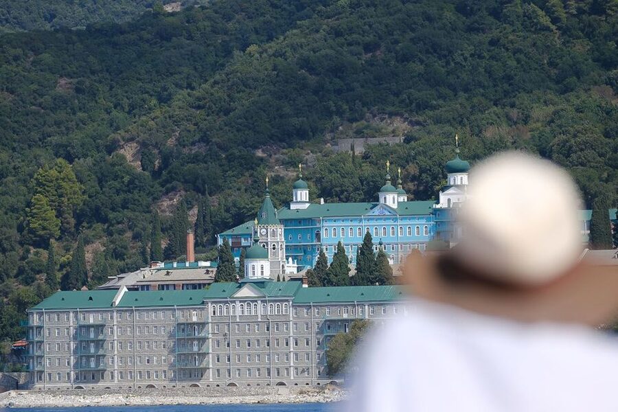 Ouranoupoli: Mount Athos Cruise with Ammouliani Island Visit - Simonos Petras, Saint Pavlou, and the high mountain backdrop