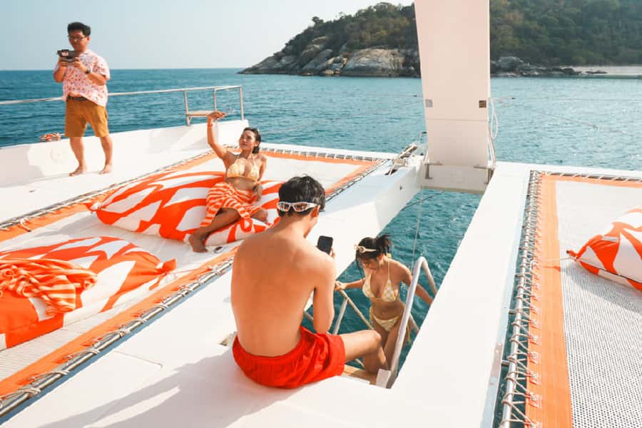 Pattaya: 3-Island Hopping Sunset Yacht & Buffet with Live DJ - Water slides, kayaks, and the yacht’s social mood