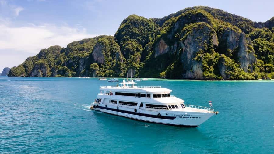 Phi Phi Island Highlights: Cruise, Snorkel & Buffet Lunch - Cruising toward Maya Bay and Pileh Lagoon