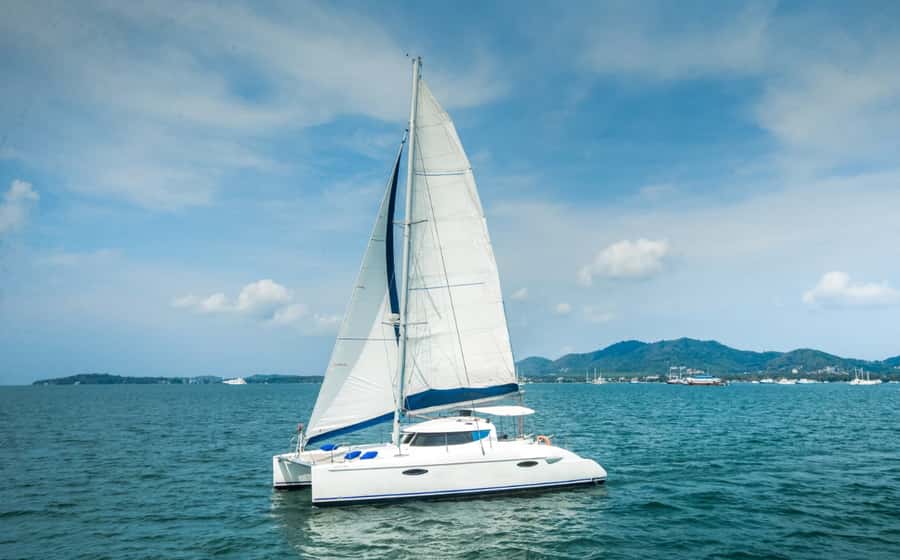 Phuket Catamaran Tour in Coral Island and Sunset Voyage - Hotel Pickup and the Run to the Marina