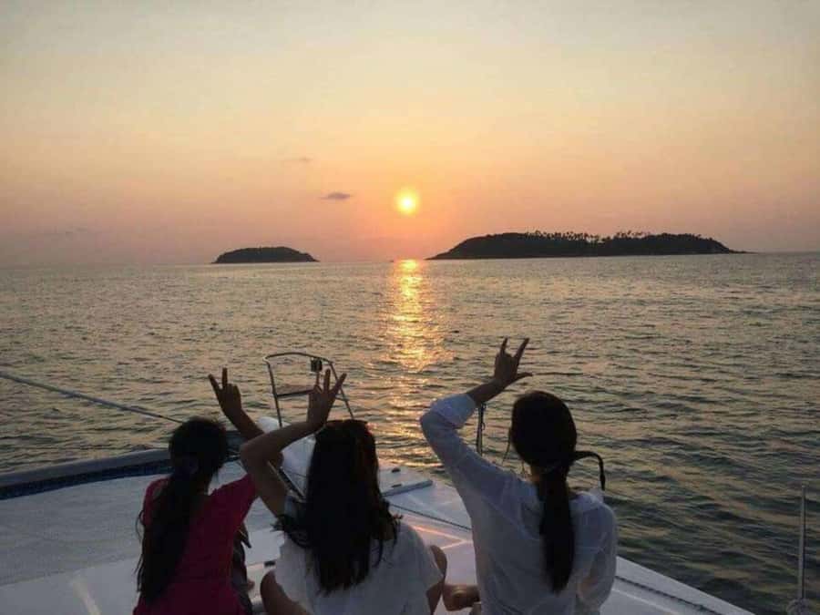 Phuket: Coral and Racha Islands Catamaran Cruise with Lunch - Fishing and sunset on the way back