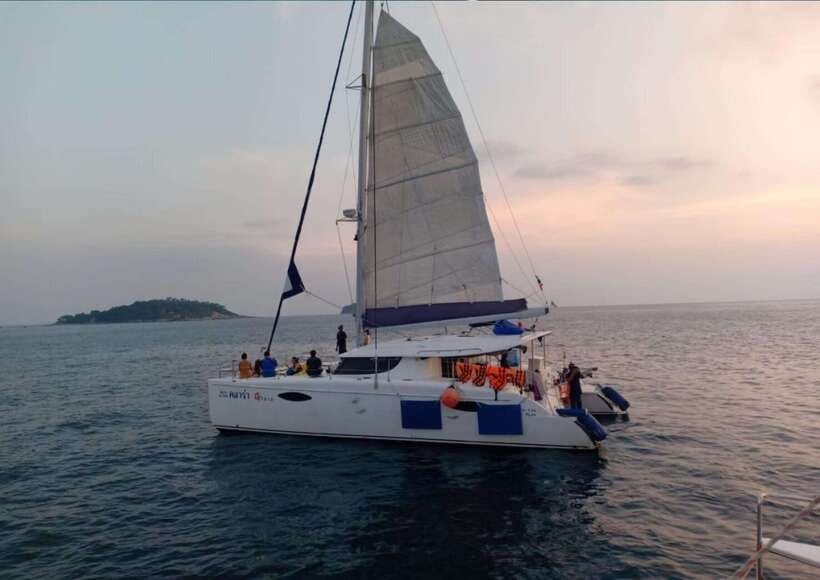 Phuket: Coral Island Catamaran Cruise with Sunset Dinner - Sailing south toward Koh Hey