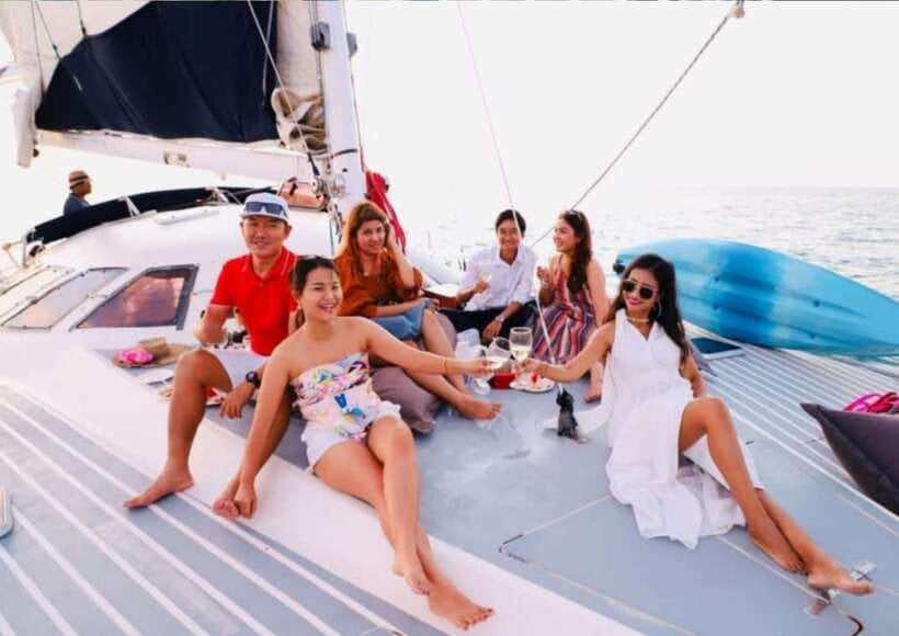Phuket: Coral Island Catamaran Cruise with Sunset Dinner - Sunset sailing near Promthep Cape