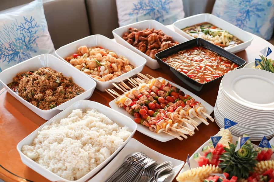 Phuket: Coral Island Day Trip and Sunset Dinner by Catamaran - From Phuket hotels to Chalong Pier