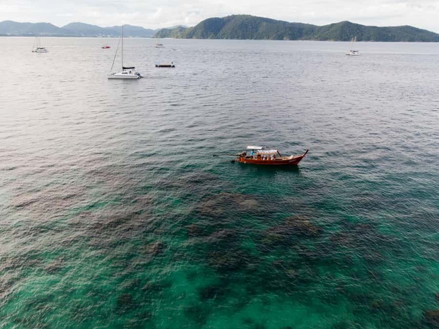 Phuket: Coral Island Luxury Long Tail Boat Half-Day Tour - Cruising toward Coral Island