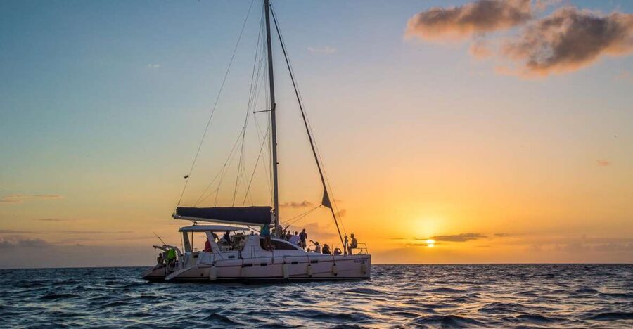 Phuket: Coral Island & Sunset Dinner by Sailing Catamaran - Setting out by catamaran from Chalong
