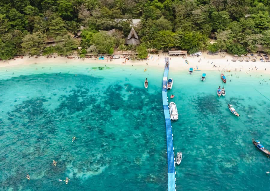 Phuket: Coral, Racha, Promthep Island Party Catamaran trip - Coral Island: swimming and optional action