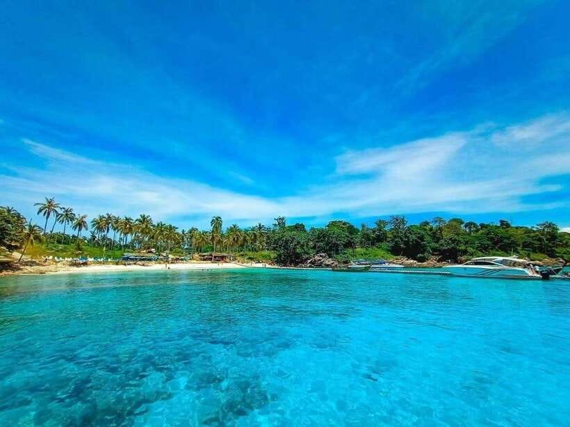 Phuket: Coral Yacht Boat Tour to Coral Island with Sunset - Yanui Bay, Coral Island, and the route details