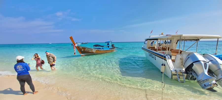 Phuket: Phi Phi Island Sunrise Group Speedboat Tour - Monkey Beach and Viking Cave from the water