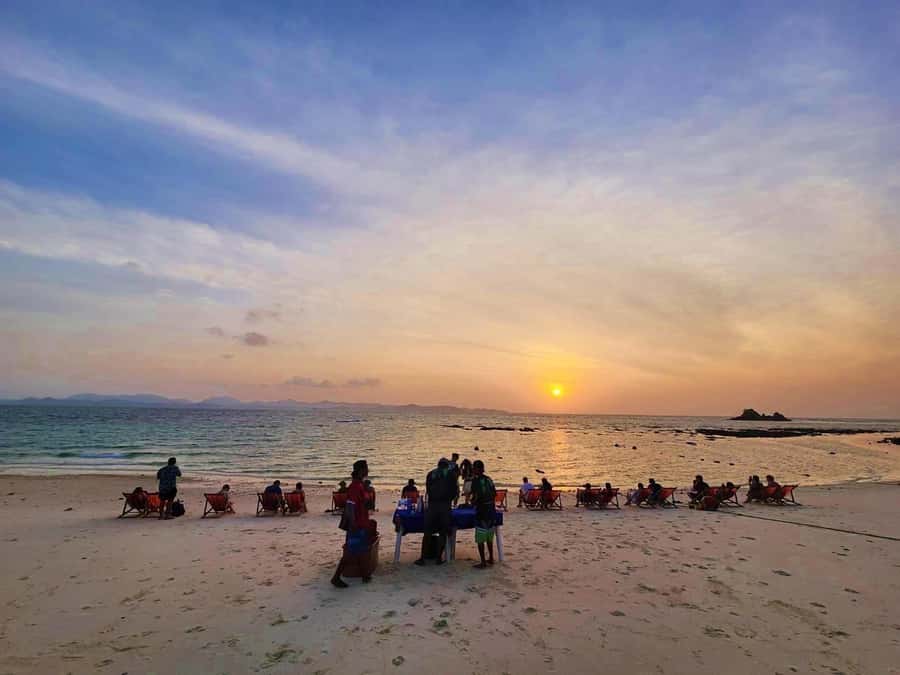 Phuket: Phi Phi Sunrise Boat Tour to Bamboo and Khai Island - Khai Nai Island at sunrise
