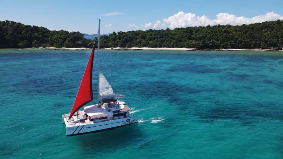 Phuket: Racha and Coral Island Sailing Day Trip by Miss.Red - Coral Island brings the first beach and water-sport stop