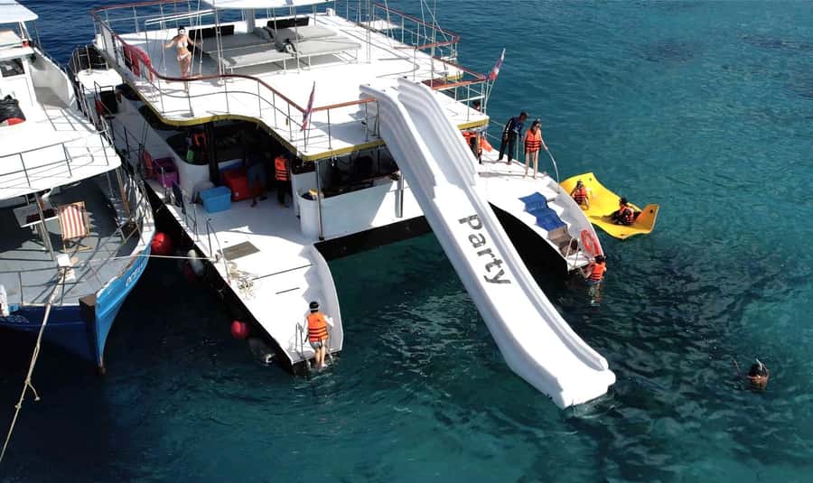 Phuket: Racha & Coral Island Catamaran Tour With Foam Party - Coral Island: lunch, snorkeling, and optional thrills