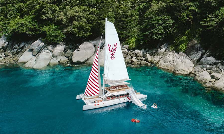 Phuket: Sailing Yacht Island Hopping & Party Full-Day Cruise - Banana Beach lunch and the first swim