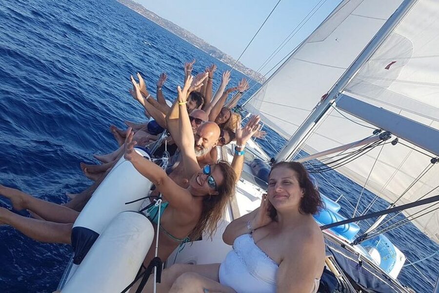 Porto San Paolo: Tavolara Island Sailboat Cruise with Lunch - Languages, Timing, and Flexible Booking