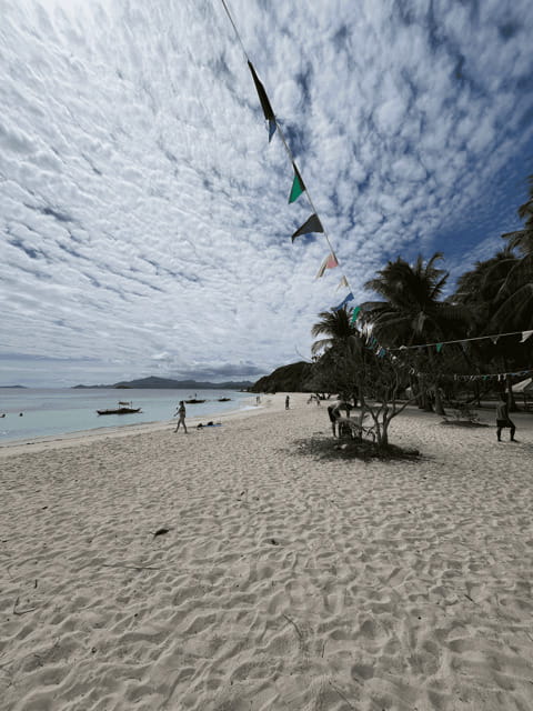 Private Boat for Culion Island Escapade Tour - Malcapuya’s white sand and clear water