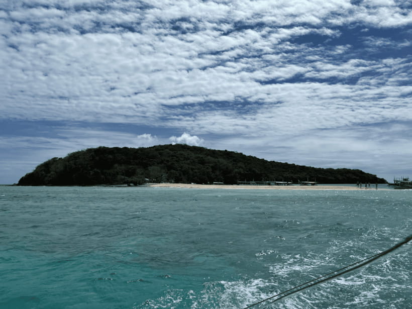 Private Boat for Culion Island Escapade Tour - The morning ride toward Malcapuya Beach