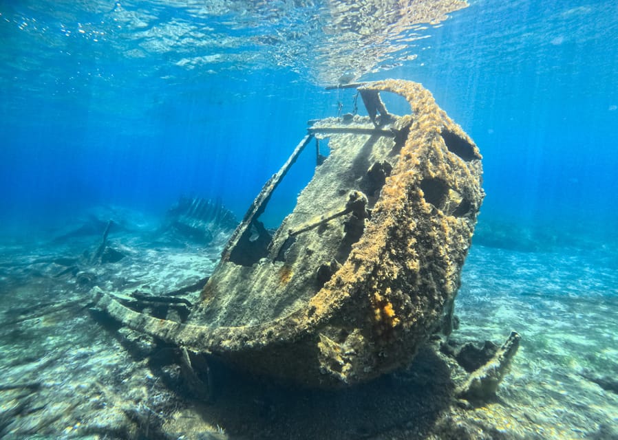 Proti Island: Snorkeling Boat Tour - Vourlia Beach and the ship below the surface